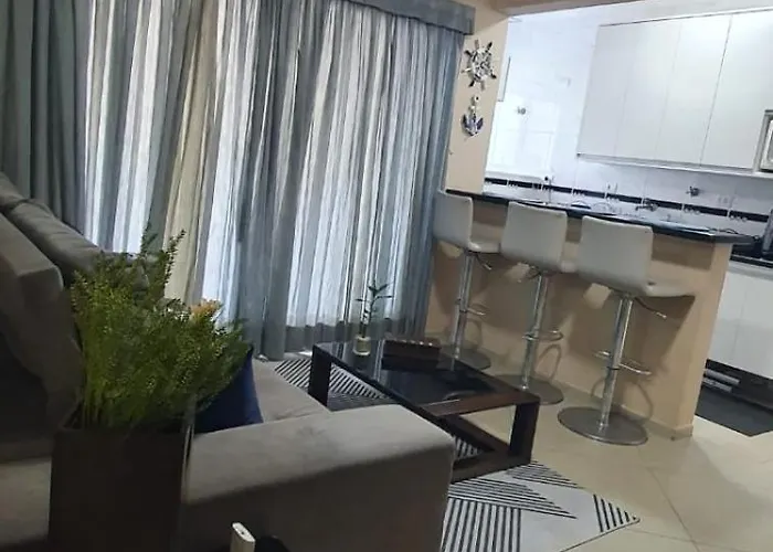 Flat Pitangueira com Piscina-Capitânia Varan Guarujá