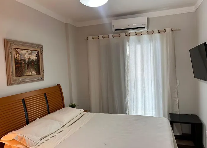 Flat Pitangueira com Piscina-Capitânia Varan Guarujá
